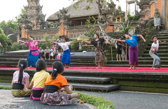 Young girl in bali learning to dance