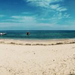 White sandy Kolbano Beach from Sotis Hotel